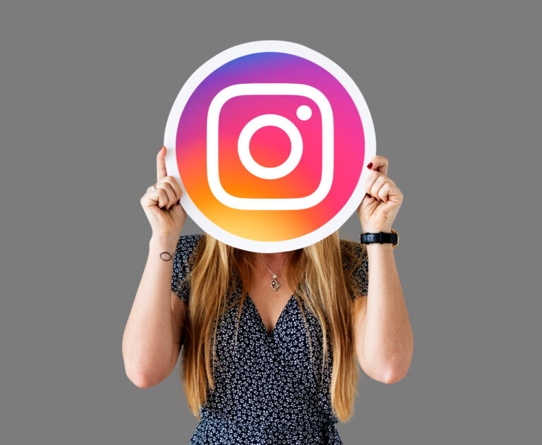 girl holding instagram icon