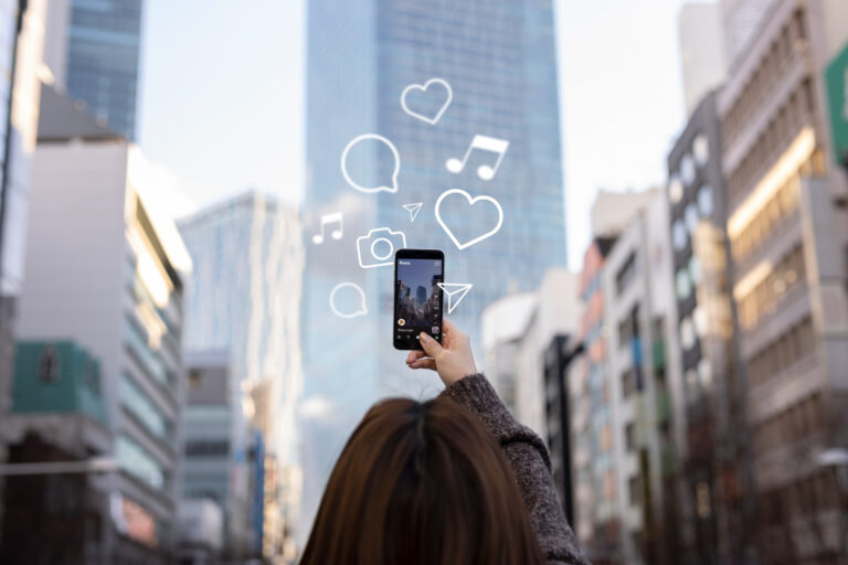 girl takes photo on smartphone