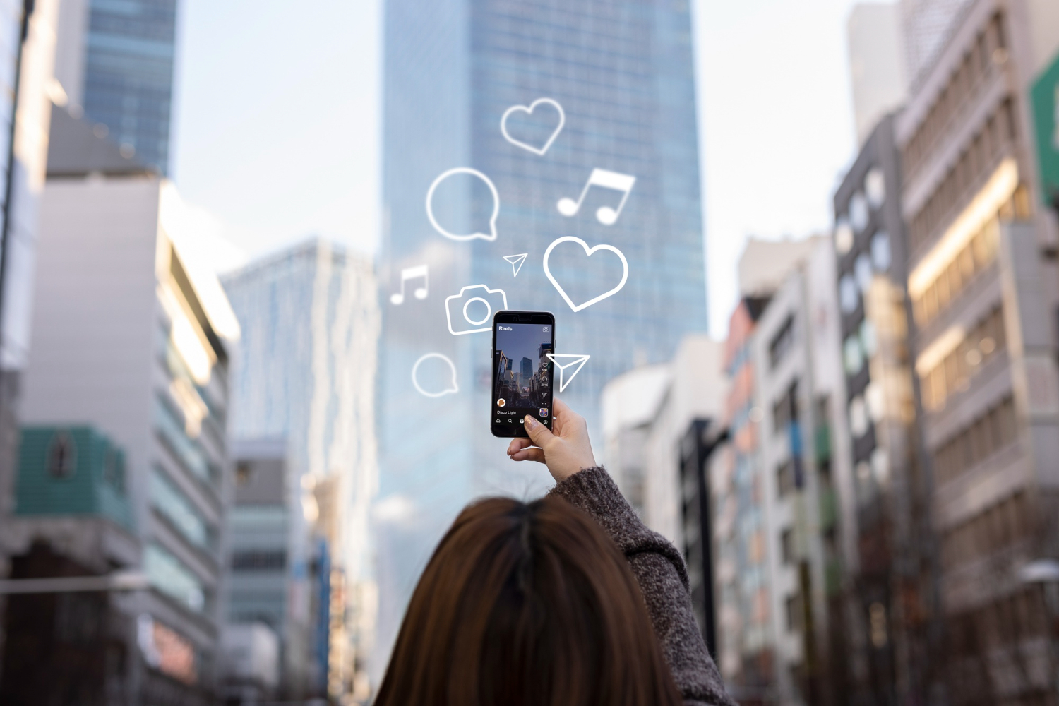 girl takes photo on smartphone