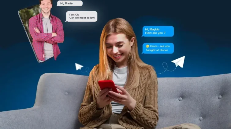 Woman sitting on a couch, texting on a smartphone with chat messages displayed on the screen.